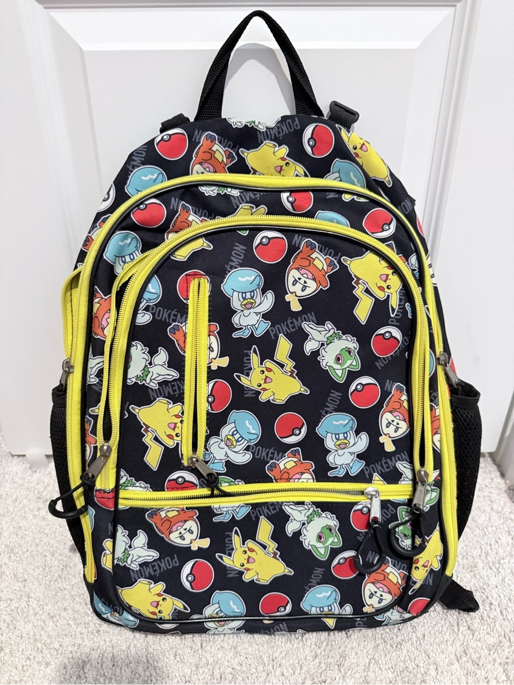 Pokemon Black Backpack with Yellow Trim and Character Print